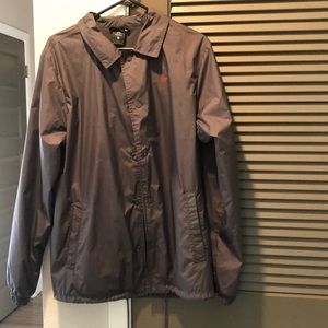 Nike SB light men’s jacket size small in men’s gray color Lightly worn.